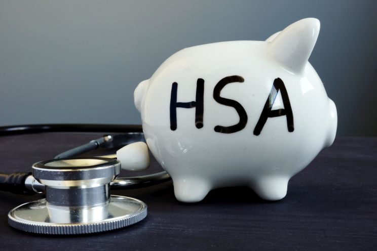 A piggy bank with HSA initials on it